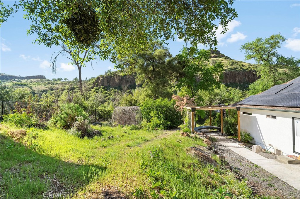 2262 Honey Run Road Chico, CA 95928 - Photo 56 of 74 a backyard of a house with lots of green space