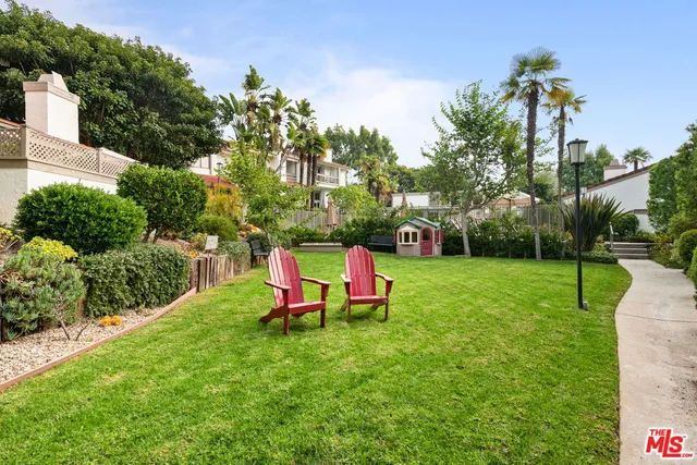 a bench sitting in the middle of a park
