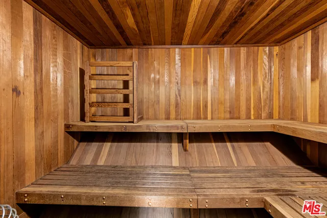 a view of a room with window and door