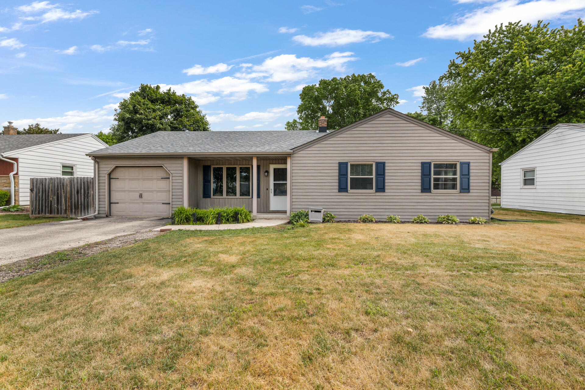 218 East Washington Street Slinger, WI 53086 - Photo 1 of 28 1-Exterior_218 E Washington ST