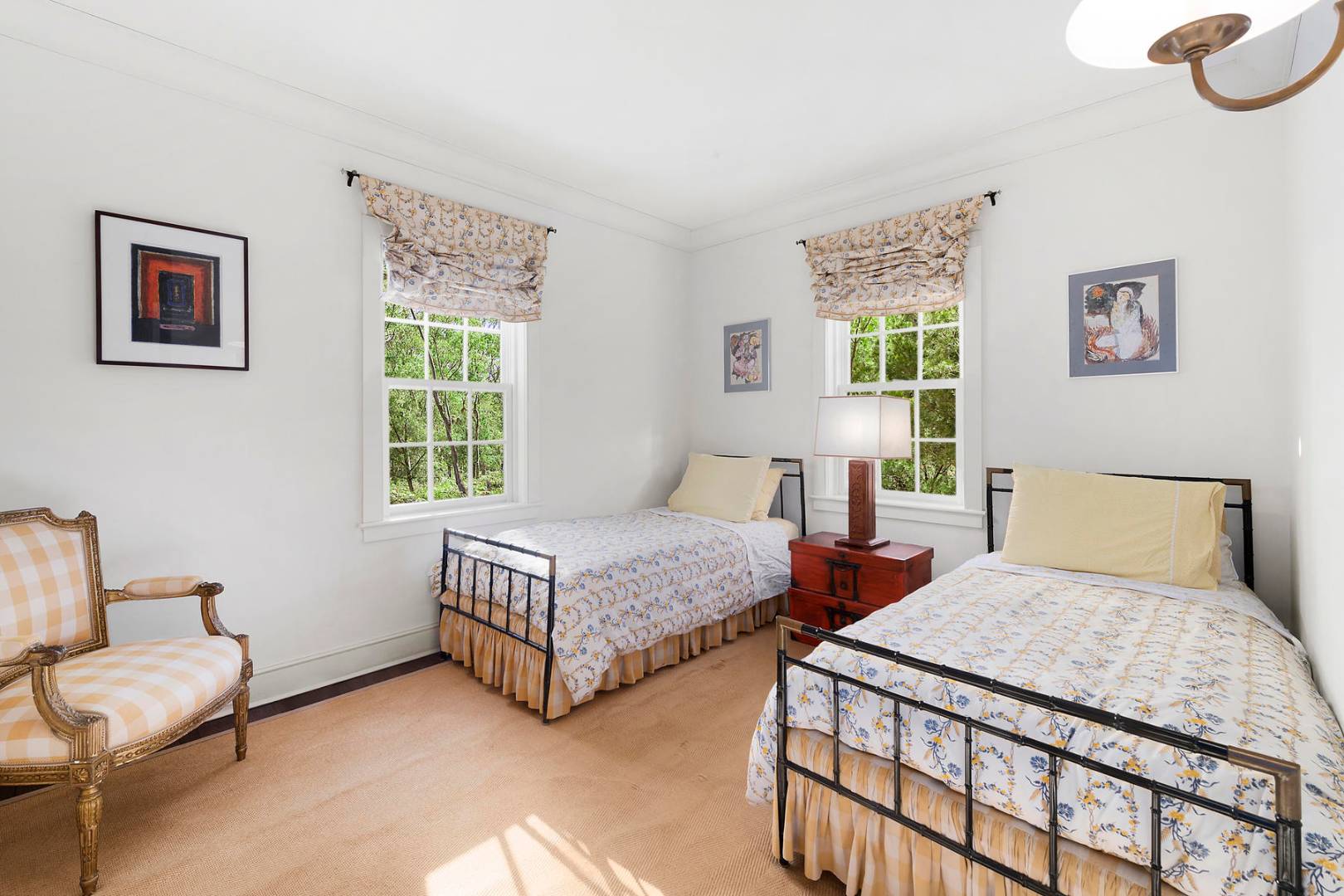 102 Georgica Road East Hampton, NY 11937 - Photo 15 of 17 a bedroom with two beds and a window