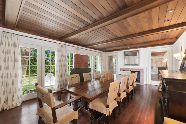 a dining room with furniture window wooden floor