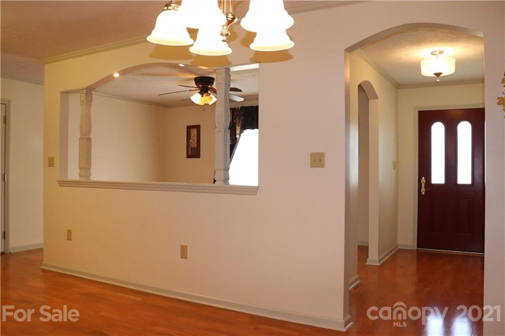 4120 Lower Cedar Valley Road Hudson, NC 28638 - Photo 13 of 48 a view of a livingroom with a chandelier