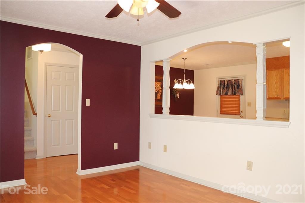 4120 Lower Cedar Valley Road Hudson, NC 28638 - Photo 16 of 48 a view of a hallway with wooden floor and cabinet