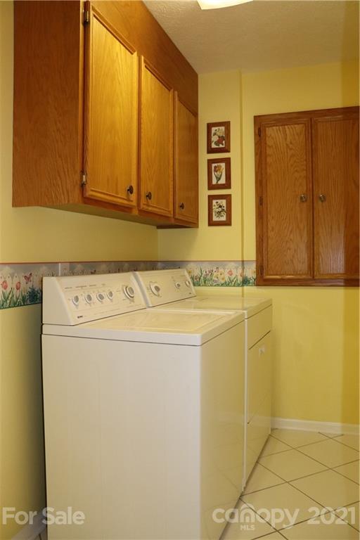 4120 Lower Cedar Valley Road Hudson, NC 28638 - Photo 38 of 48 a utility room with dryer and washer