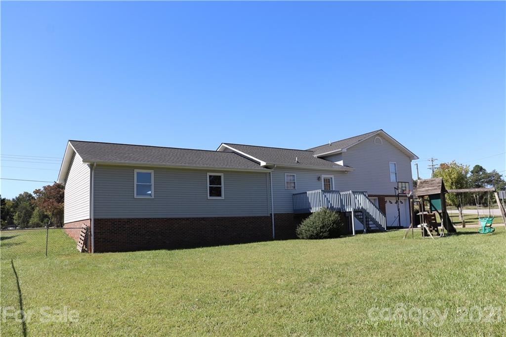 4120 Lower Cedar Valley Road Hudson, NC 28638 - Photo 5 of 48 a house view with a outdoor space