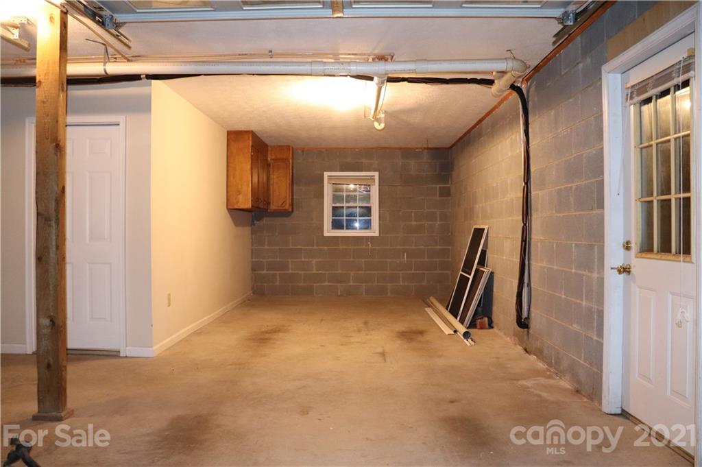 4120 Lower Cedar Valley Road Hudson, NC 28638 - Photo 45 of 48 a view of a hallway with a window