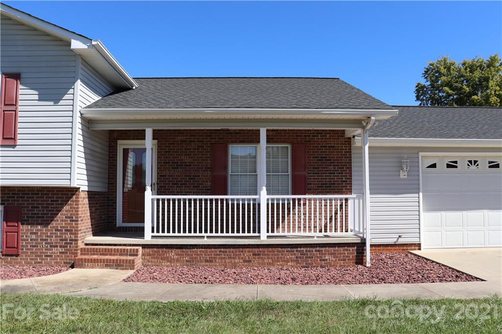 4120 Lower Cedar Valley Road Hudson, NC 28638 - Photo 7 of 48 a view of a house with a yard