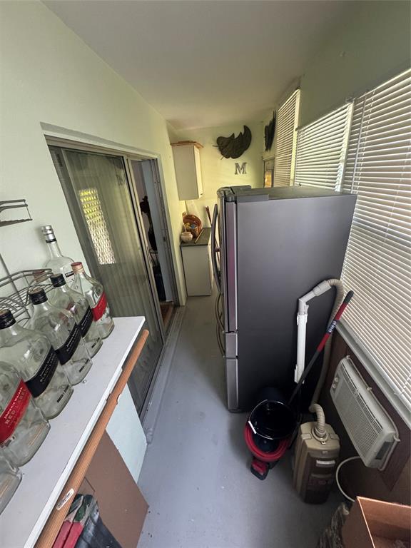 61 Camden C, Unit C West Palm Beach, FL 33417 - Photo 15 of 23 a view of a room with gym equipment