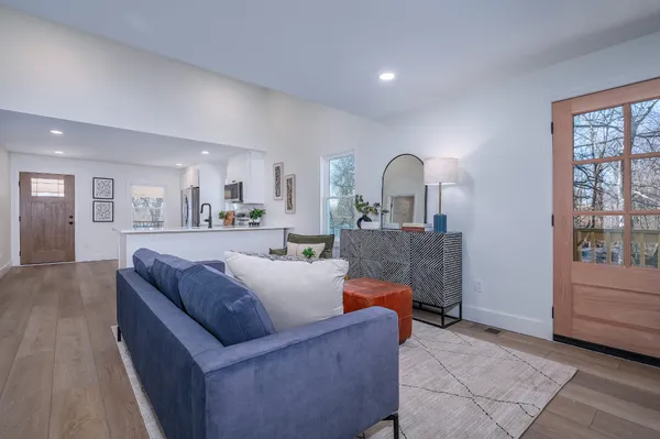 a living room with furniture and a window