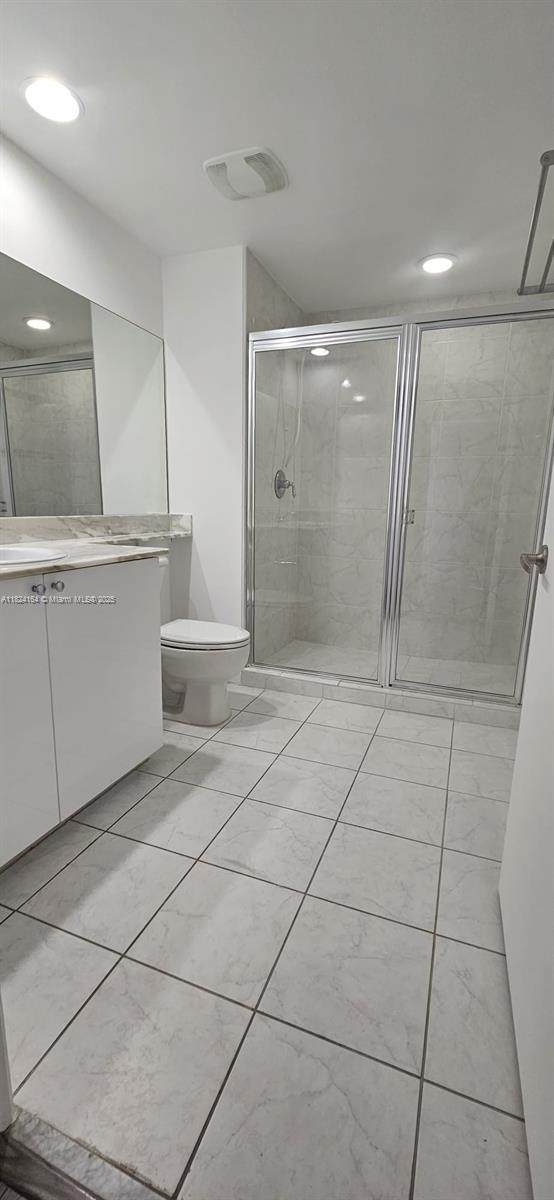 2775 Northeast 187th Street, Unit 424 Aventura, FL 33180 - Photo 16 of 16 a bathroom with a mirror and a shower