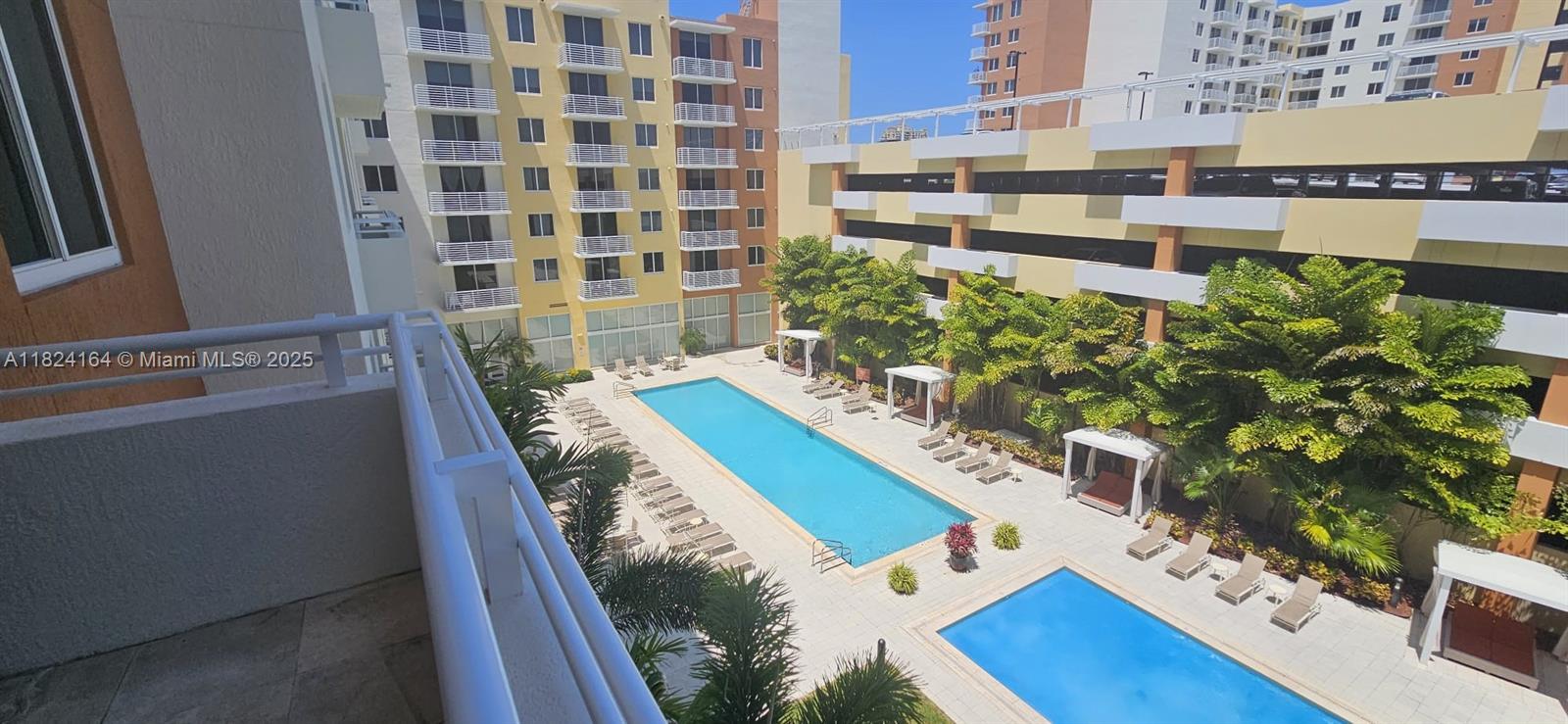 2775 Northeast 187th Street, Unit 424 Aventura, FL 33180 - Photo 7 of 16 a view of balcony with furniture