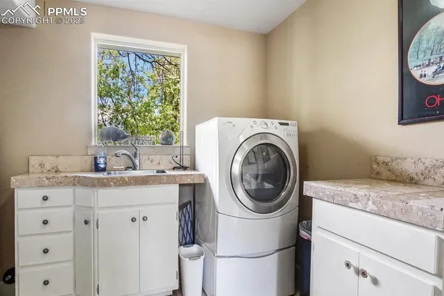a utility room with dryer and washer