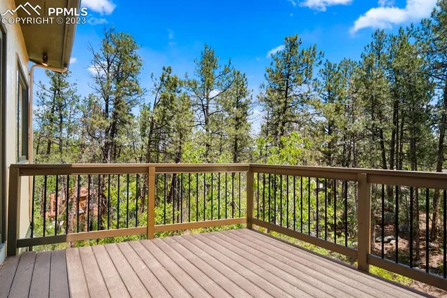 a view of balcony with wooden floor