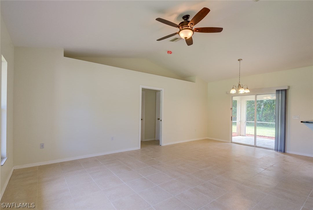 7232 Coolidge Road Fort Myers, FL 33967 - Photo 11 of 25 an empty room with windows and fan