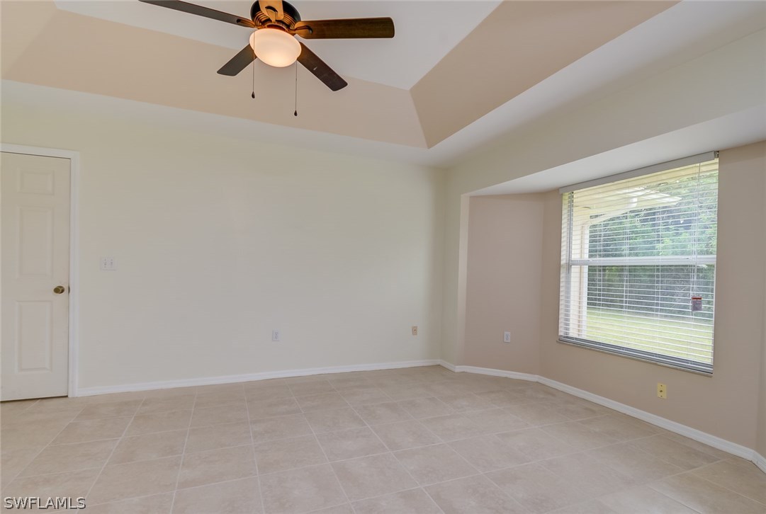 7232 Coolidge Road Fort Myers, FL 33967 - Photo 13 of 25 a view of an empty room with a window