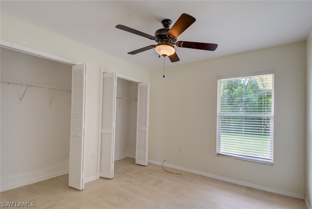 7232 Coolidge Road Fort Myers, FL 33967 - Photo 18 of 25 a view of a livingroom with a ceiling fan and window