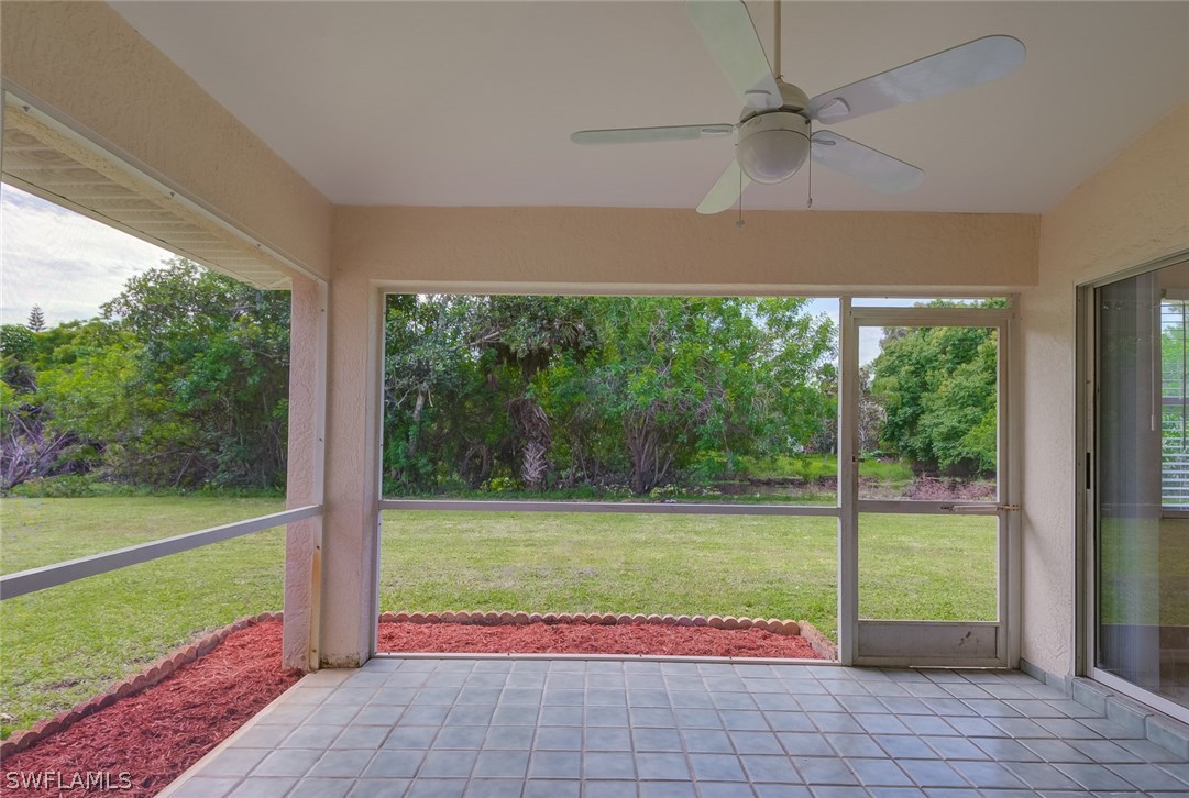 7232 Coolidge Road Fort Myers, FL 33967 - Photo 20 of 25 a view of a room with porch and a backyard