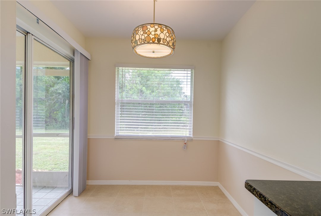 7232 Coolidge Road Fort Myers, FL 33967 - Photo 10 of 25 a view of an empty room with a window