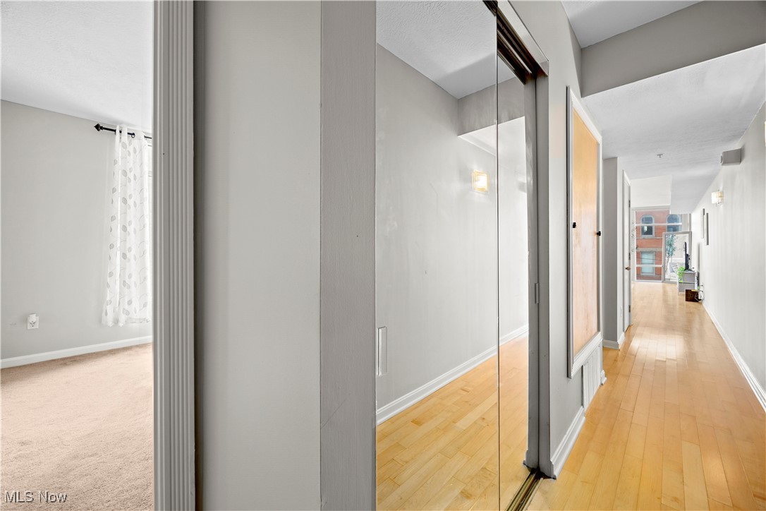 2222 Detroit Avenue, Unit 519 Cleveland, OH 44113 - Photo 22 of 30 Hall featuring light wood flooring
