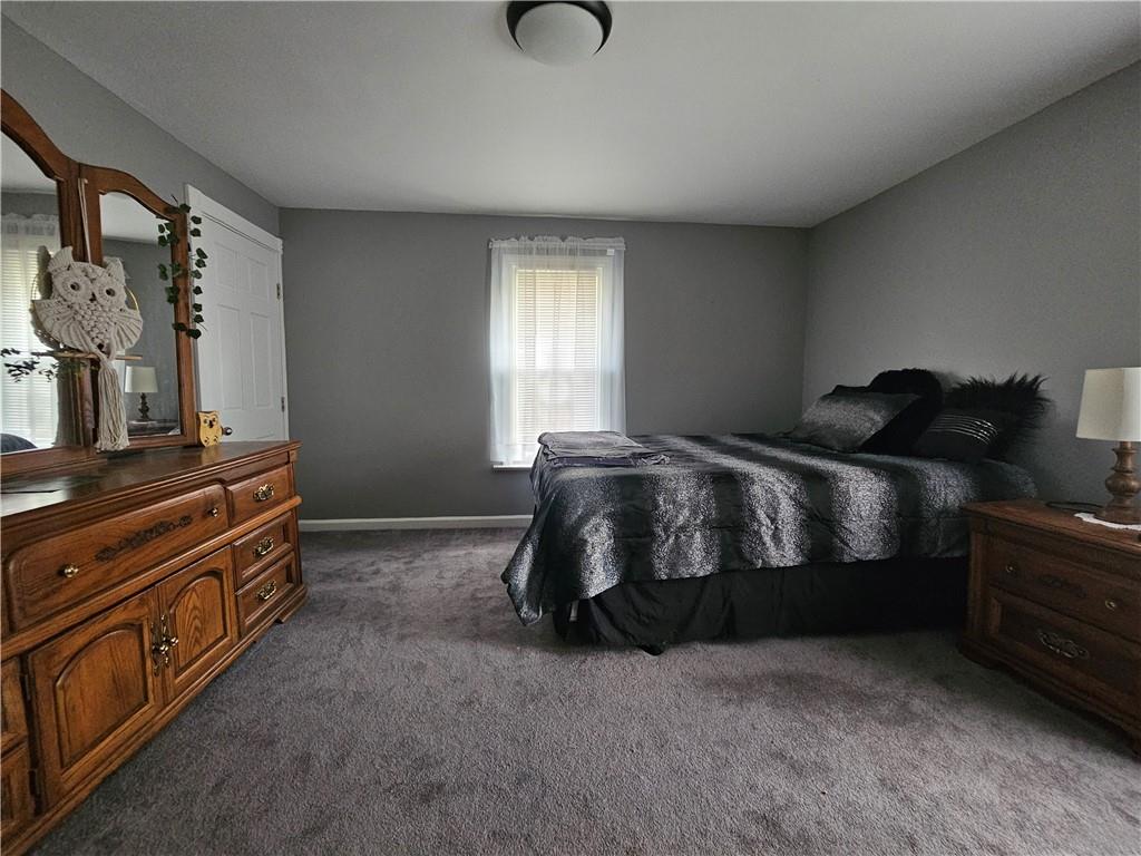 121 North Road Butler, PA 16001 - Photo 13 of 39 a bedroom with a bed and window