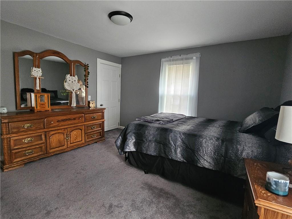 121 North Road Butler, PA 16001 - Photo 14 of 39 a bedroom with a bed and window