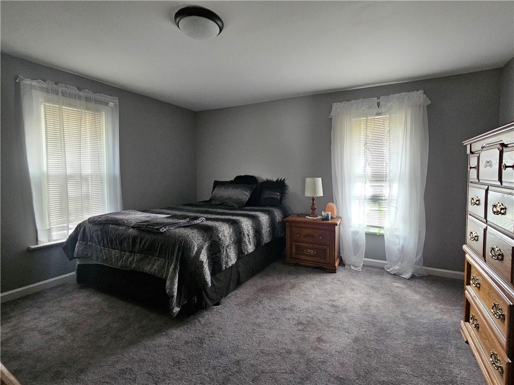 121 North Road Butler, PA 16001 - Photo 15 of 39 a bedroom with a bed and a window