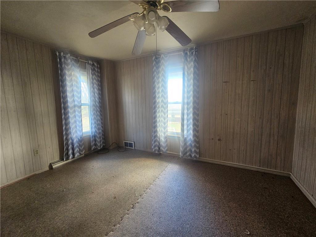 121 North Road Butler, PA 16001 - Photo 23 of 39 an empty room with windows and fan