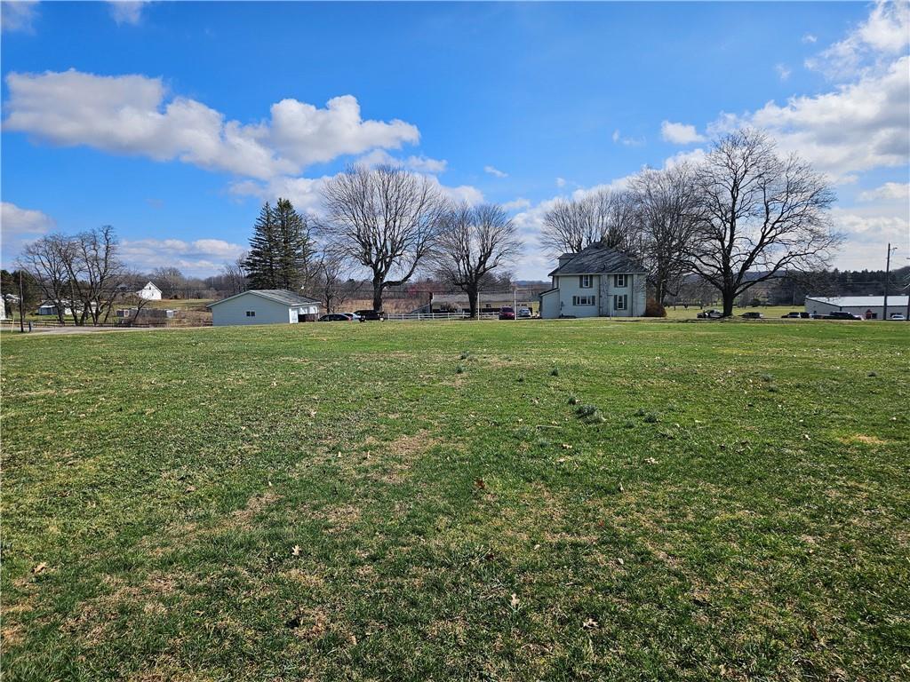 121 North Road Butler, PA 16001 - Photo 37 of 39 a view of a big yard with a house in the background