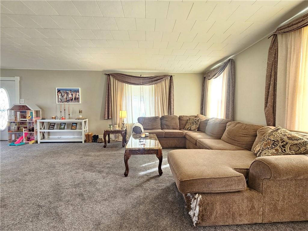121 North Road Butler, PA 16001 - Photo 5 of 39 a living room with furniture and a large window