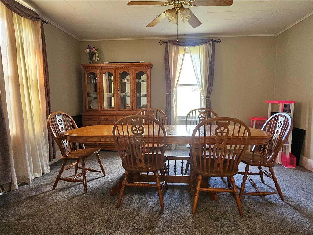 121 North Road Butler, PA 16001 - Photo 7 of 39 a view of a dining room with furniture window and outside view