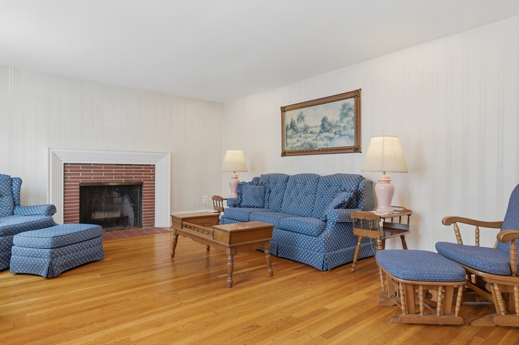 188 Glendale Road Attleboro, MA 02703 - Photo 3 of 37 a living room with furniture and a fireplace