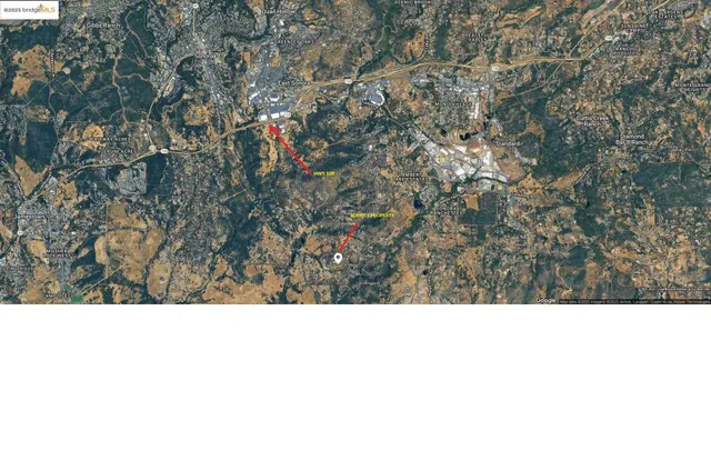 a black and white photo of a house