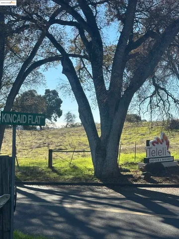 a view of swimming pool with a yard