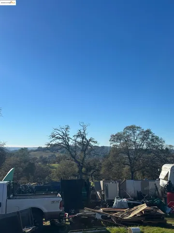 a view of residential houses with outdoor space