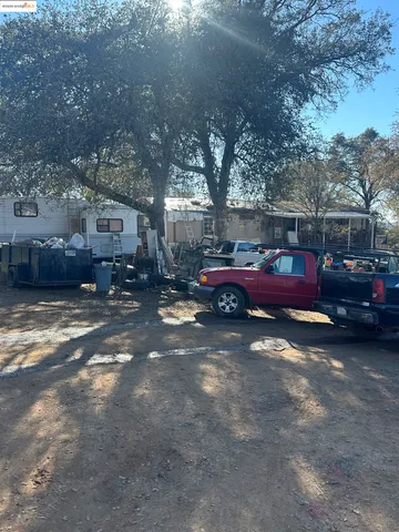 a cars parked in front of a house