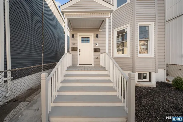 a picture of a bench in a white wall