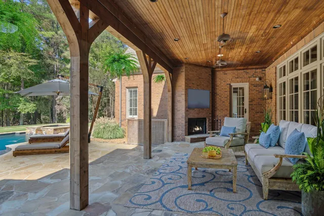 a view of living room filled with furniture
