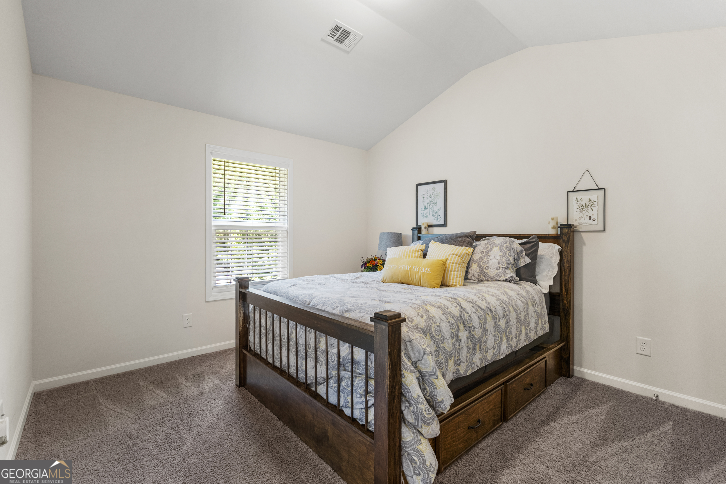 209 Marsh Road West Point, GA 31833 - Photo 16 of 50 a bedroom with a bed and window