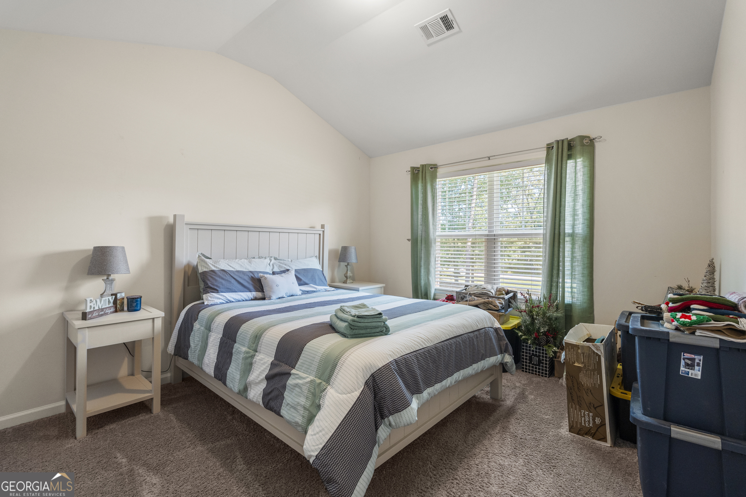 209 Marsh Road West Point, GA 31833 - Photo 19 of 50 a bedroom with a bed and a window
