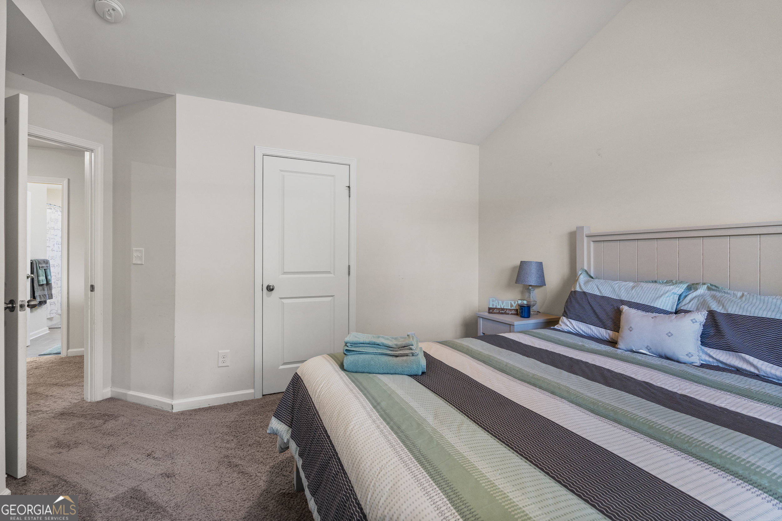 209 Marsh Road West Point, GA 31833 - Photo 20 of 50 a bedroom with a bed and wooden floor