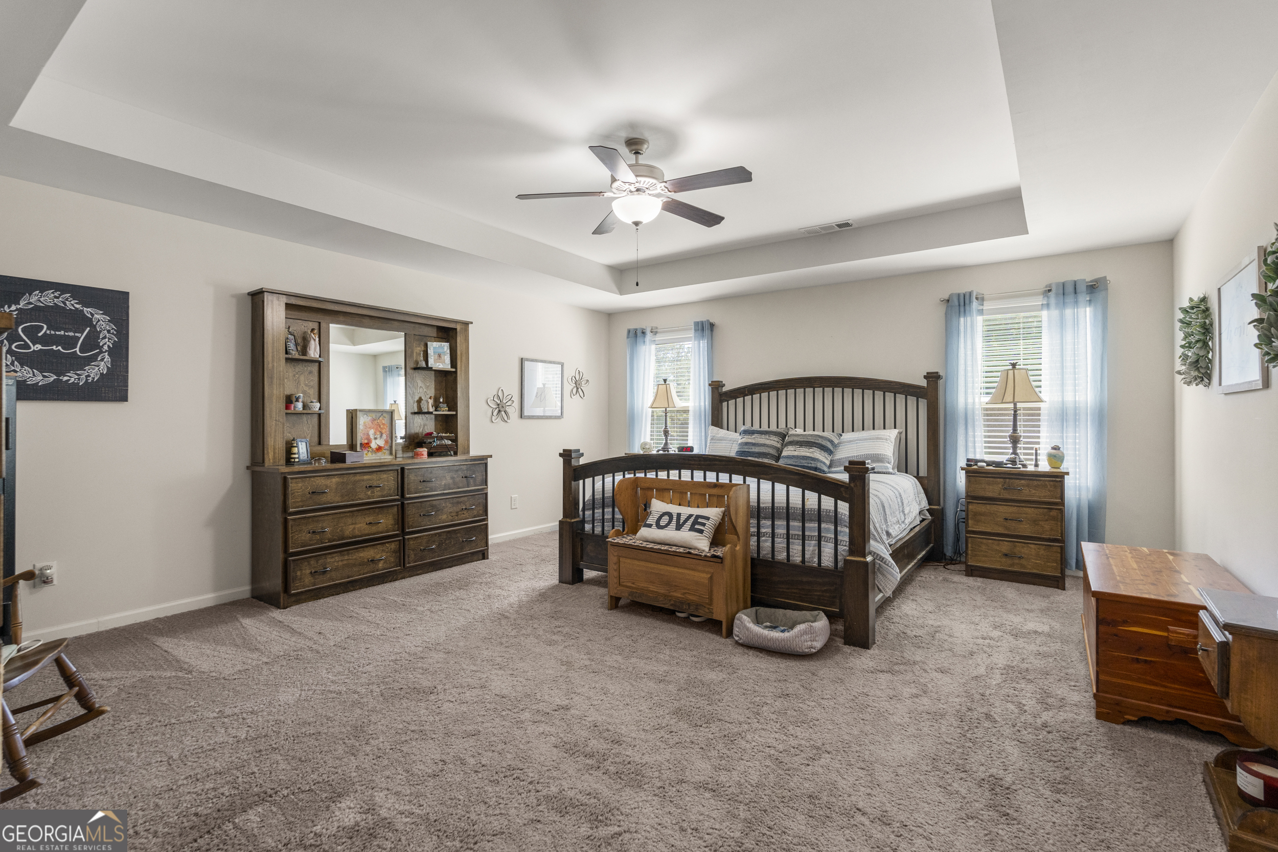 209 Marsh Road West Point, GA 31833 - Photo 21 of 50 a bedroom with a bed and a chandelier