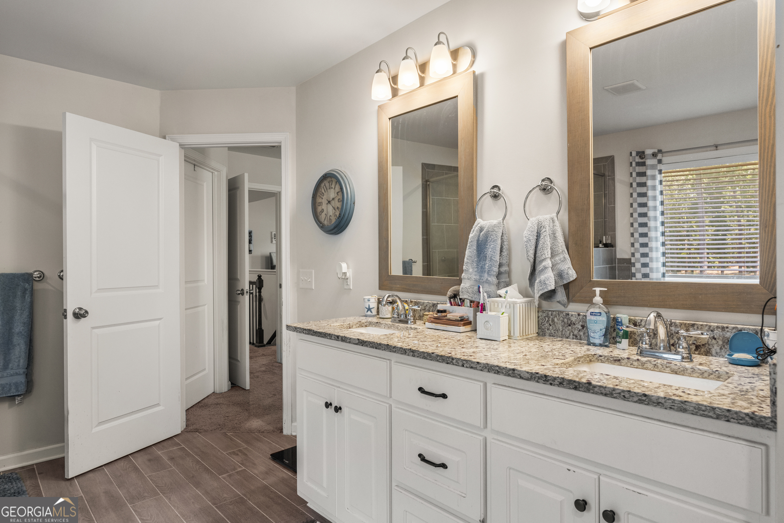 209 Marsh Road West Point, GA 31833 - Photo 26 of 50 a bathroom with a granite countertop sink and a mirror