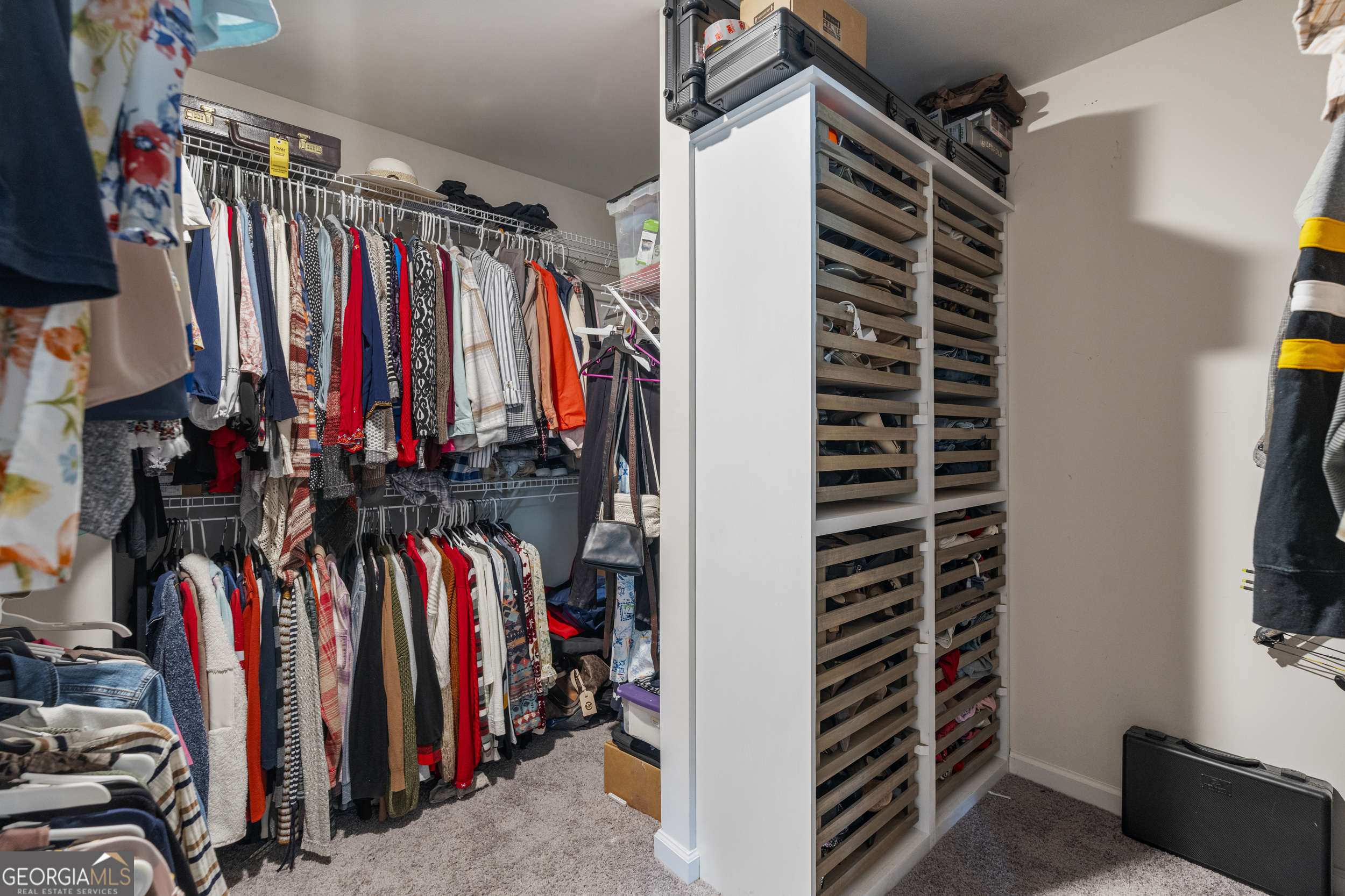209 Marsh Road West Point, GA 31833 - Photo 28 of 50 a view of walk in closet with clothes and shoes