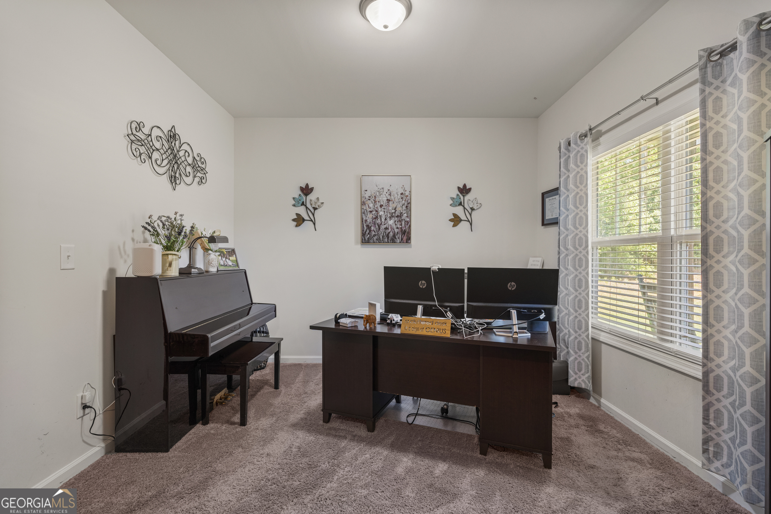 209 Marsh Road West Point, GA 31833 - Photo 32 of 50 a view of a workspace with furniture and a window