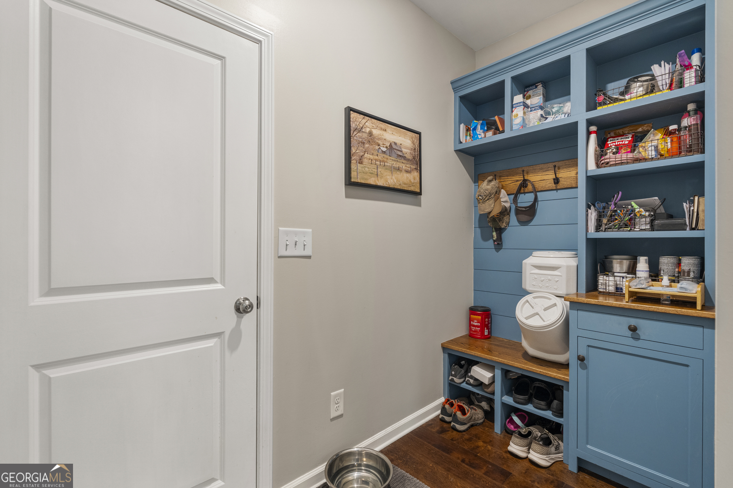 209 Marsh Road West Point, GA 31833 - Photo 33 of 50 a reading room with wooden floor and book shelf