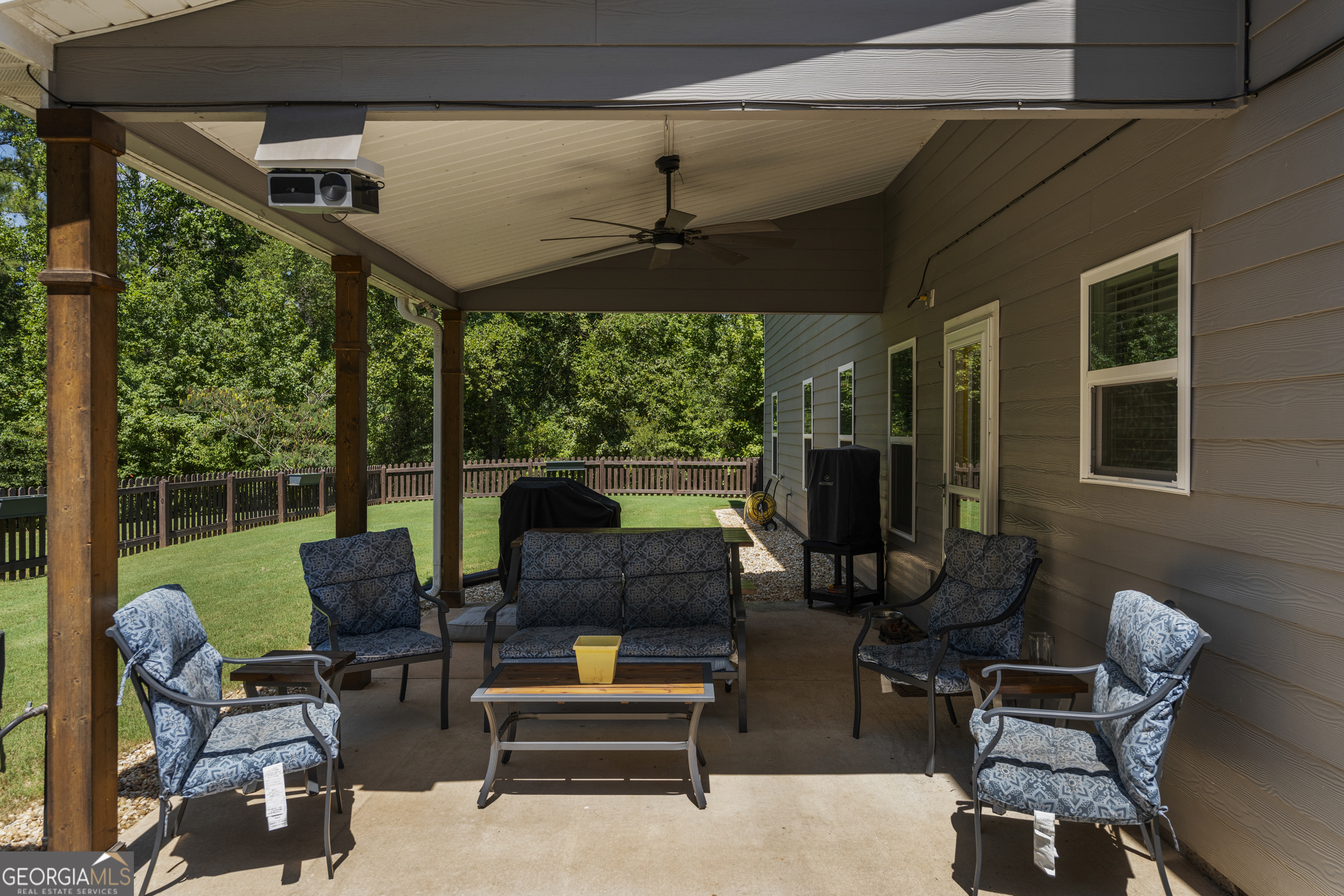 209 Marsh Road West Point, GA 31833 - Photo 40 of 50 a outdoor living space with furniture potted plant and a fireplace