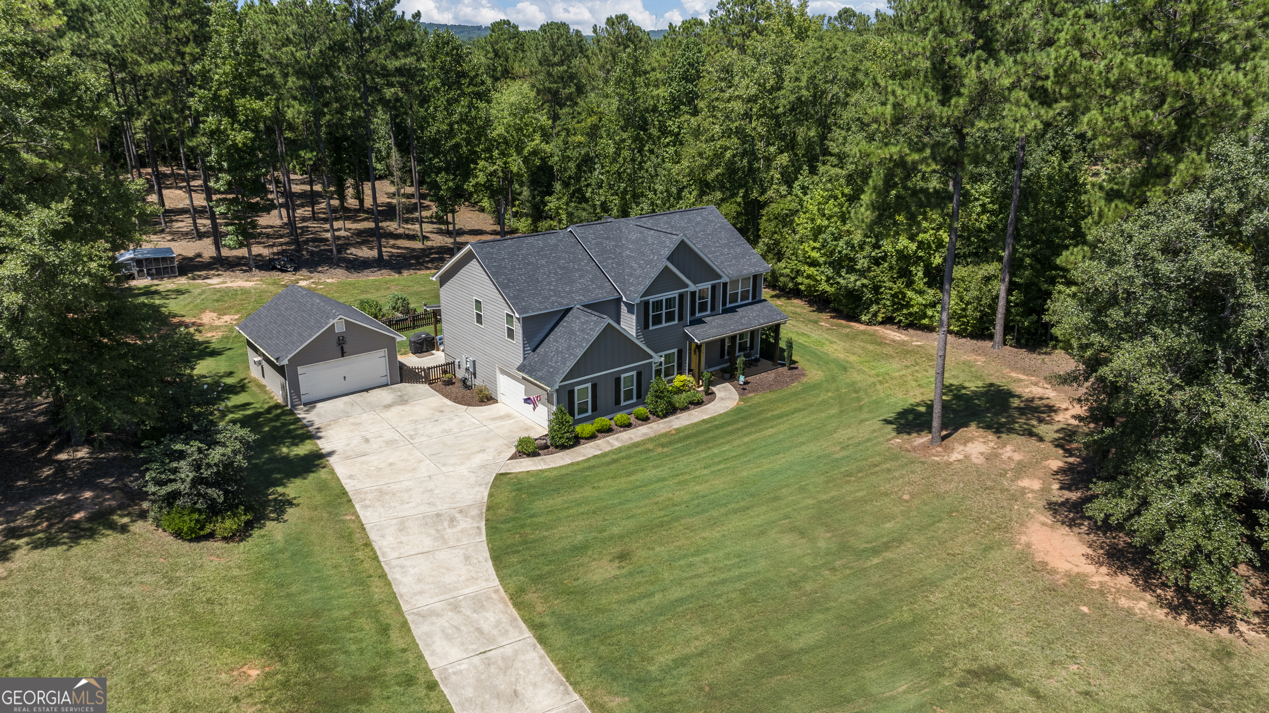 209 Marsh Road West Point, GA 31833 - Photo 43 of 50 a view of backyard with a garden and entertaining space