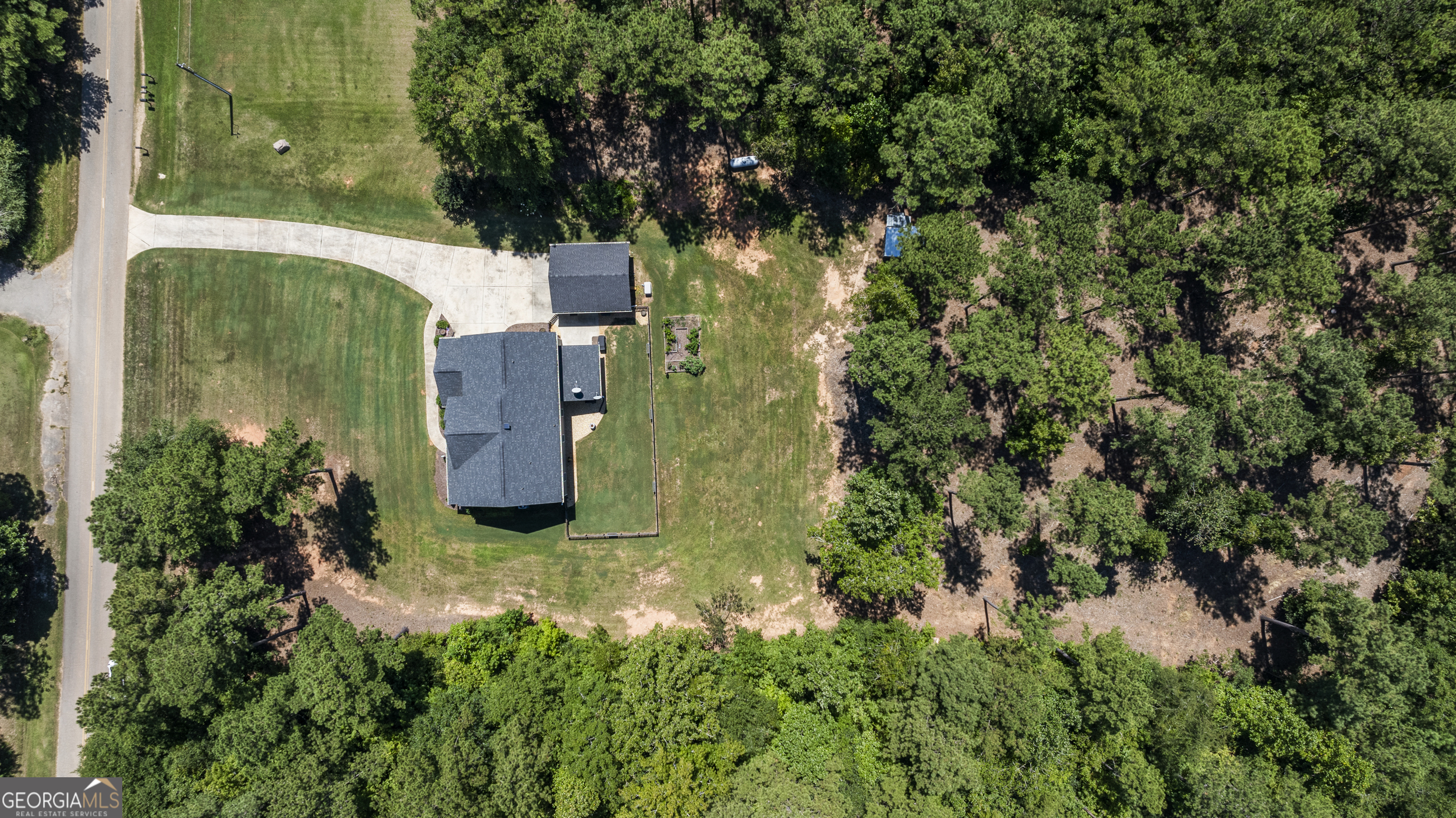 209 Marsh Road West Point, GA 31833 - Photo 47 of 50 an aerial view of a house with a yard
