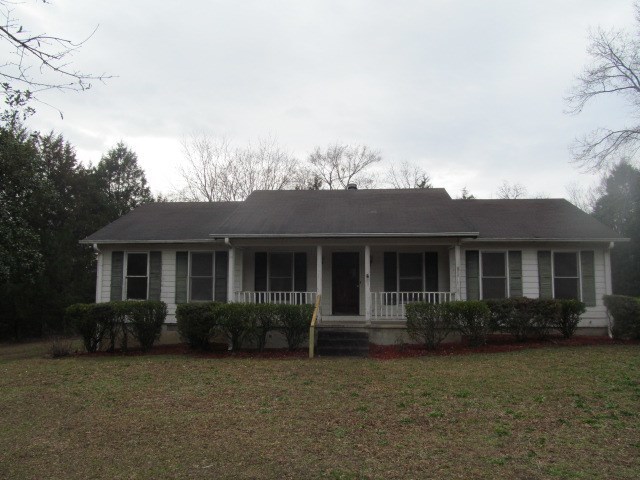 6501 Barfield Road Macon, GA 31216 - Photo 1 of 13 front view of house with a yard